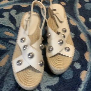 Marc Fisher whit sandals with metal ball details.